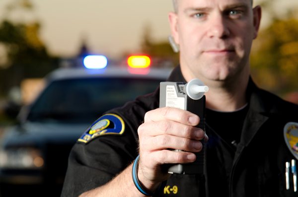dui and alcohol abuse - police officer breathalyzer - victory addiction recovery center